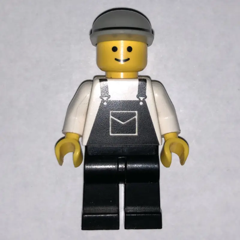 Man, Black Overalls, Light Gray Cap