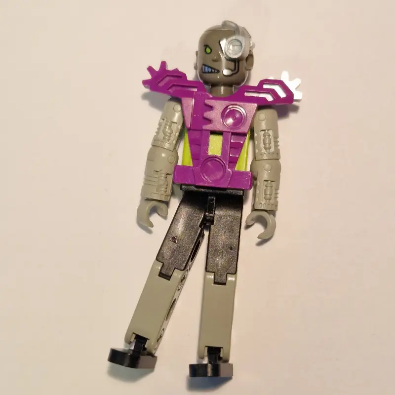 Technic Figure Cyborg, Black Legs, Purple Armour, Mechanical Arms, Dark Gray Head, Cyborg Eyepiece - Purple Vest