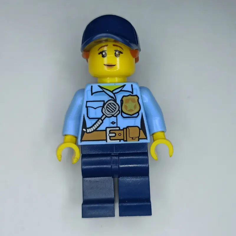 Policewoman, Bright Light Blue Shirt, Dark Blue Legs, Dark Blue Cap with Ponytail